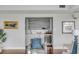 Stylish bar area featuring sleek cabinetry, a wine fridge, and elegant glassware display at 330 Concord St # 18F, Charleston, SC 29401