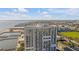 An exterior of a tall condo building featuring multiple balconies with city views at 330 Concord St # 18F, Charleston, SC 29401
