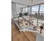 Aerial view of an open-concept home with modern staircase, and beautiful views from the floor to ceiling windows at 330 Concord St # 18F, Charleston, SC 29401