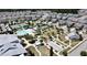 Aerial view featuring tennis courts, a bocce court, and a luxurious community pool at 3997 Aspera Dr, Summerville, SC 29483