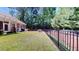 View of home's lush, fenced backyard with privacy and plenty of green space at 3997 Aspera Dr, Summerville, SC 29483