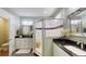Bathroom showcasing double vanity sinks, stone counter tops, framed mirrors and glass enclosed shower at 3997 Aspera Dr, Summerville, SC 29483