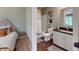 Bathroom featuring modern fixtures, tile floors, white cabinets and a shower-tub combination at 3997 Aspera Dr, Summerville, SC 29483