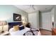 Bedroom featuring a ceiling fan, desk, and double-door closet at 3997 Aspera Dr, Summerville, SC 29483