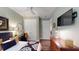 Bedroom boasts a ceiling fan, television, desk, and double-door closet at 3997 Aspera Dr, Summerville, SC 29483