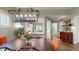 Dining area with an ornate chandelier and a view of the kitchen at 3997 Aspera Dr, Summerville, SC 29483
