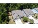 Aerial view of a two-story home with a two-car garage, well maintained landscaping, and mature trees at 3997 Aspera Dr, Summerville, SC 29483