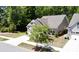 Charming home featuring a two-car garage, concrete driveway, and landscaped front yard at 3997 Aspera Dr, Summerville, SC 29483