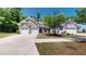 Charming home with a three car garage, manicured lawn, and inviting curb appeal at 3997 Aspera Dr, Summerville, SC 29483