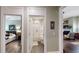 Hallway view of study, bedroom and bathroom featuring a shower with a shower curtain at 3997 Aspera Dr, Summerville, SC 29483