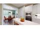 Modern kitchen with built-in oven and dining space at 3997 Aspera Dr, Summerville, SC 29483