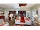 Spacious living room with stylish decor, comfortable seating, and access to other rooms at 3997 Aspera Dr, Summerville, SC 29483