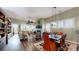Open living space with hardwood floors, fireplace, and cozy seating at 3997 Aspera Dr, Summerville, SC 29483