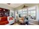 Bright and airy living room featuring comfortable seating, large windows, and elegant decor at 3997 Aspera Dr, Summerville, SC 29483