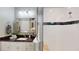 Well-lit main bathroom with granite-topped vanity and glass-enclosed walk-in shower at 3997 Aspera Dr, Summerville, SC 29483