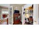 Bonus area with office space and custom built-ins with a view to the dining room at 3997 Aspera Dr, Summerville, SC 29483