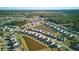 Areal image of a planned community with homes surrounding tranquil ponds at 413 Ribiero Dr, Summerville, SC 29486