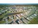 Birds-eye view highlighting this home's location near community pond and green spaces at 413 Ribiero Dr, Summerville, SC 29486