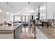 Kitchen featuring granite countertops, a center island with bar stools, and stainless steel appliances at 413 Ribiero Dr, Summerville, SC 29486