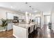 Kitchen with granite island, pendant lights, stainless steel appliances, and an open layout at 413 Ribiero Dr, Summerville, SC 29486