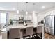 Kitchen showcasing a granite island, pendant lighting, and stainless steel appliances at 413 Ribiero Dr, Summerville, SC 29486