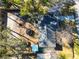 Aerial view of the property showing a well-maintained home, mature trees, and outdoor recreational space at 4437 Garwood Dr, Ladson, SC 29456