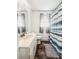 A bathroom with a vanity, a toilet, a shower, and a window at 4437 Garwood Dr, Ladson, SC 29456