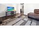 Spacious living room featuring modern furnishings and hardwood flooring at 4437 Garwood Dr, Ladson, SC 29456