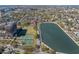 Panoramic aerial view of the home's location near the park and lake, highlighting the city skyline at 49 Ashley Ave, Charleston, SC 29401