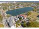 Charming neighborhood with lake access, tennis courts, and manicured lawns from an aerial perspective at 49 Ashley Ave, Charleston, SC 29401
