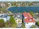 Stunning aerial view of the home with a waterfront view and city skyline in the background at 49 Ashley Ave, Charleston, SC 29401