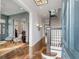Elegant entryway with hardwood floors, staircase, and views into adjacent living spaces at 49 Ashley Ave, Charleston, SC 29401