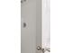 Close up of shower with brushed nickel hardware and bright white shower surround at 551 Gahagan Rd, Summerville, SC 29486