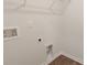 The utility room has laminate floors and white walls and includes a laundry sink hook-up at 551 Gahagan Rd, Summerville, SC 29486