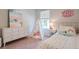 Bright bedroom featuring a whimsical teepee tent, white dresser, and cozy decor, creating a delightful space at 553 Gahagan Rd, Summerville, SC 29486