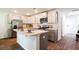 Well-equipped kitchen with stainless steel appliances, ample storage, and an island with a sink at 555 Gahagan Rd, Summerville, SC 29486