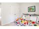 Bedroom featuring a daybed and closet with folding doors at 557 Gahagan Rd, Summerville, SC 29486