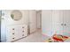 Bright bedroom featuring a white dresser and closet with a door at 557 Gahagan Rd, Summerville, SC 29486