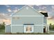Charming townhome side view showing siding, brick foundation, and professionally landscaped flower bed at 557 Gahagan Rd, Summerville, SC 29486