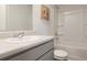 Bathroom featuring a gray vanity, toilet, and shower-tub combo at 559 Gahagan Rd, Summerville, SC 29486