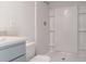 Modern bathroom featuring a stand-up shower with built-in shelves and white tile at 559 Gahagan Rd, Summerville, SC 29486