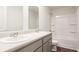 Bright bathroom featuring double sinks, modern fixtures, and a shower-tub combo with tiled walls at 559 Gahagan Rd, Summerville, SC 29486