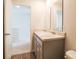 Bright bathroom featuring double sinks and modern fixtures with a large mirror over the countertop at 559 Gahagan Rd, Summerville, SC 29486