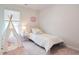 bedroom with tent, bed, and bright natural light from the large window at 559 Gahagan Rd, Summerville, SC 29486