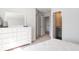 Bright main bedroom with a large dresser, big mirror, and ensuite bathroom at 559 Gahagan Rd, Summerville, SC 29486