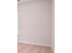 A view of an empty white wall and trim with neutral carpet and baseboard, and window at 561 Gahagan Rd, Summerville, SC 29486