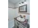 Classic bathroom featuring a tub and shower combination, a vanity with sink and bronze fixtures at 5823 Lakeview Dr, Hanahan, SC 29410
