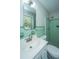 Well-lit full bathroom features vanity with mirror and a shower at 5823 Lakeview Dr, Hanahan, SC 29410