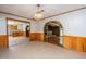 Spacious dining room showcases archways, wood accents, and a view to the kitchen at 5823 Lakeview Dr, Hanahan, SC 29410