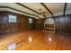 Hardwood floors and wood paneled walls in a spacious living room at 5823 Lakeview Dr, Hanahan, SC 29410